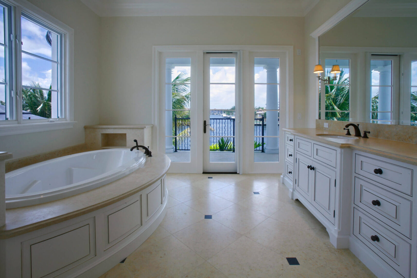 A large bathroom with a tub and sink.