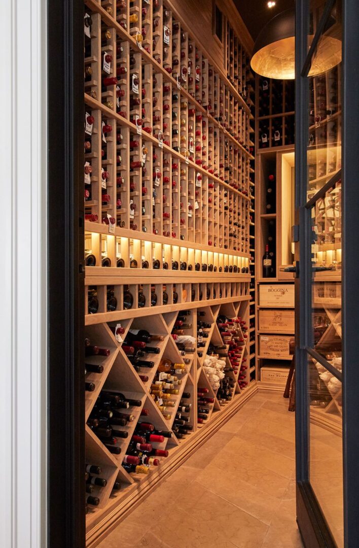 A wine cellar with many bottles of wine.