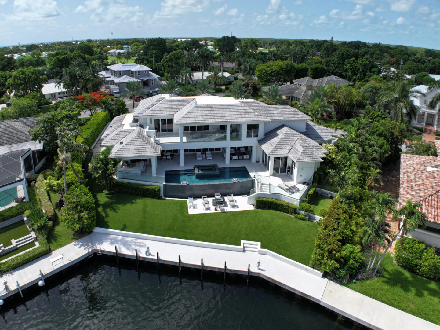 Luxury waterfront home with pool.