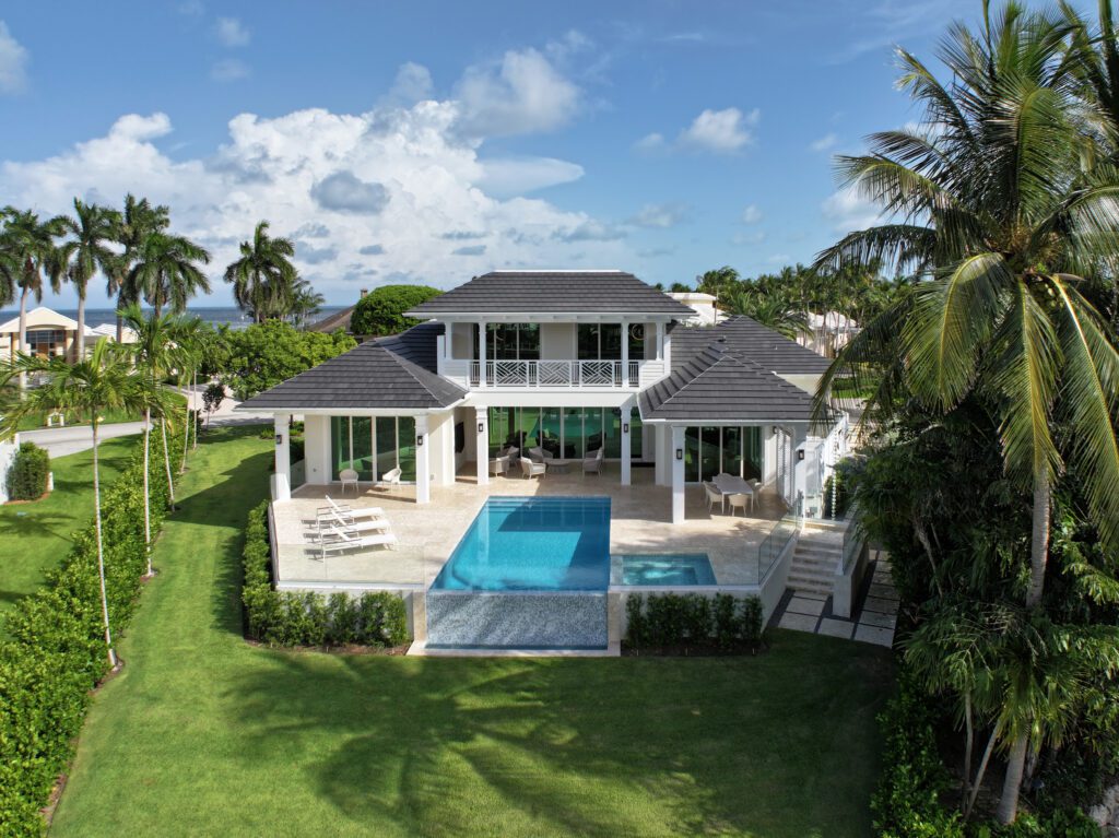 Luxury waterfront home with pool.