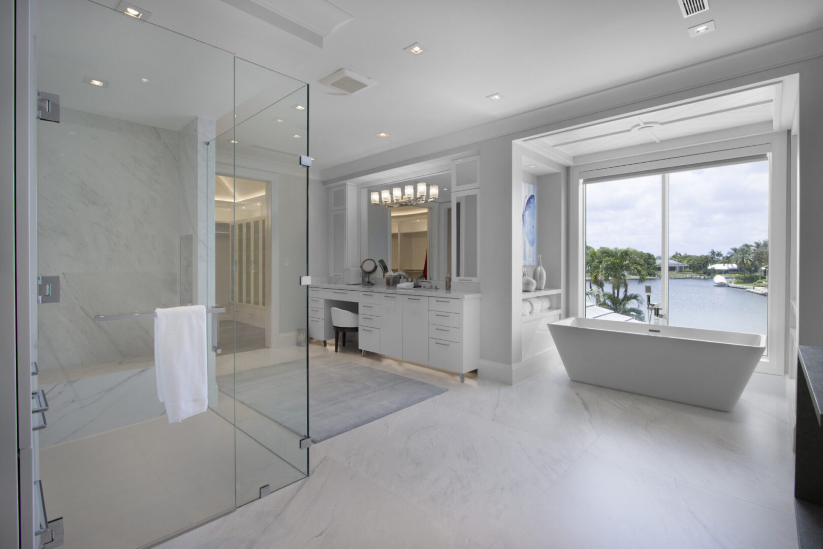 Modern bathroom with walk-in shower and bathtub.